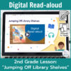 Laptop computer screen showing Jumping Off Library Shelves Digital Read-aloud title slide with 2 banners reading Digital Read-aloud and 2nd Grade Lesson Jumping Off Library Shelves.