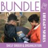 2 children looking at a book and an iPad.